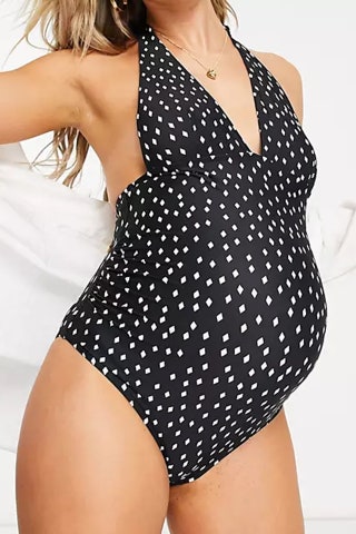 The Frolic Maternity Halter Plunge Swimsuit 34 ASOS  Why we love it “There's something so flattering about polka dots...