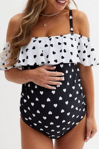 Maternity Black Heart Frill Bardot Swimsuit 29.99 New Look  Why we love it “It's so pretty I want to wear it when I go...
